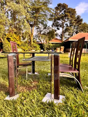 Elegant Glass Top Dining Table With 3 Leather Chairs