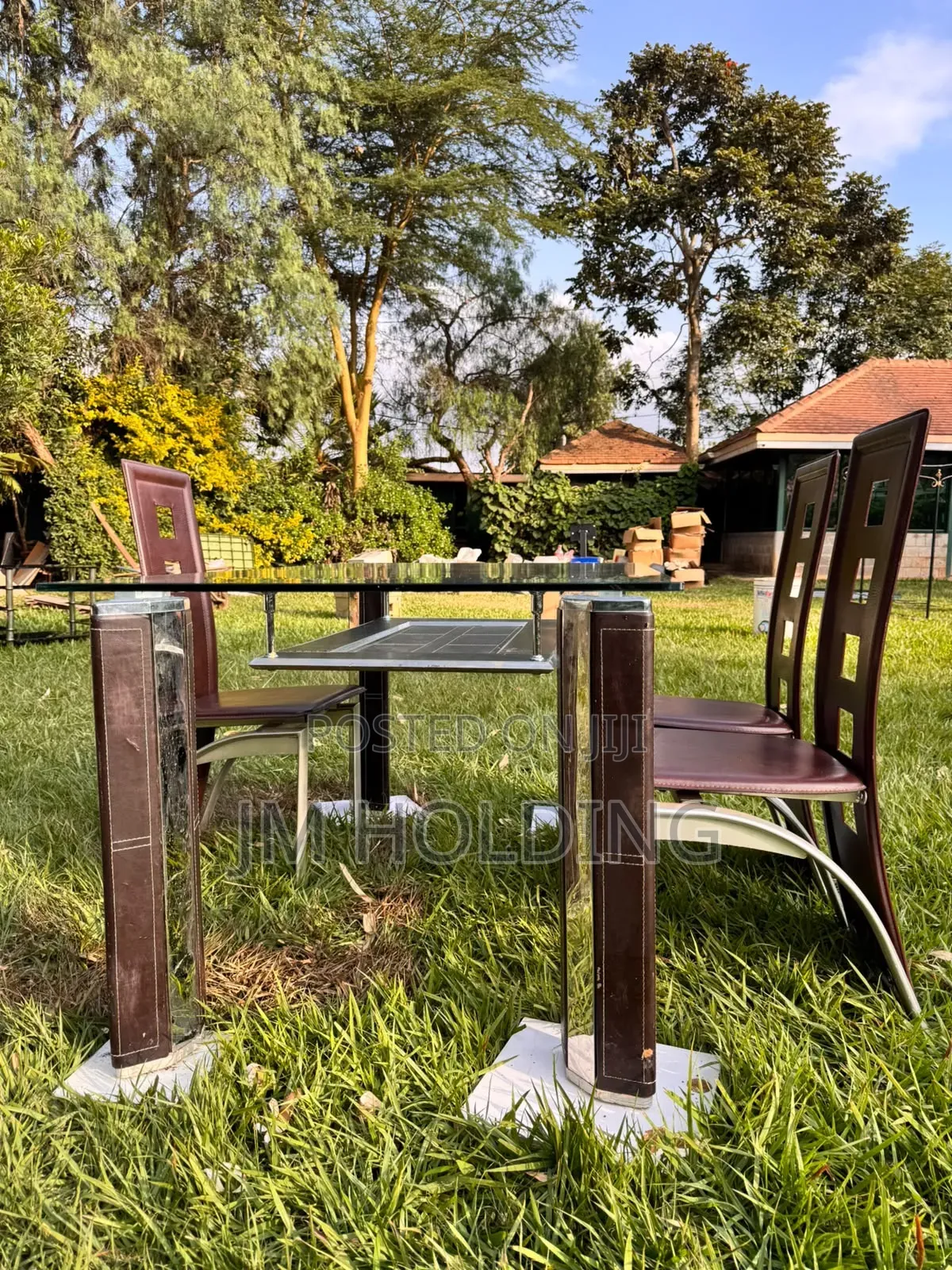 Elegant Glass Top Dining Table With 3 Leather Chairs