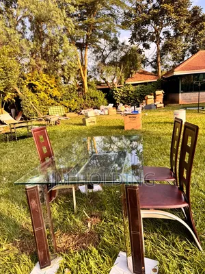 Elegant Glass Top Dining Table With 3 Leather Chairs