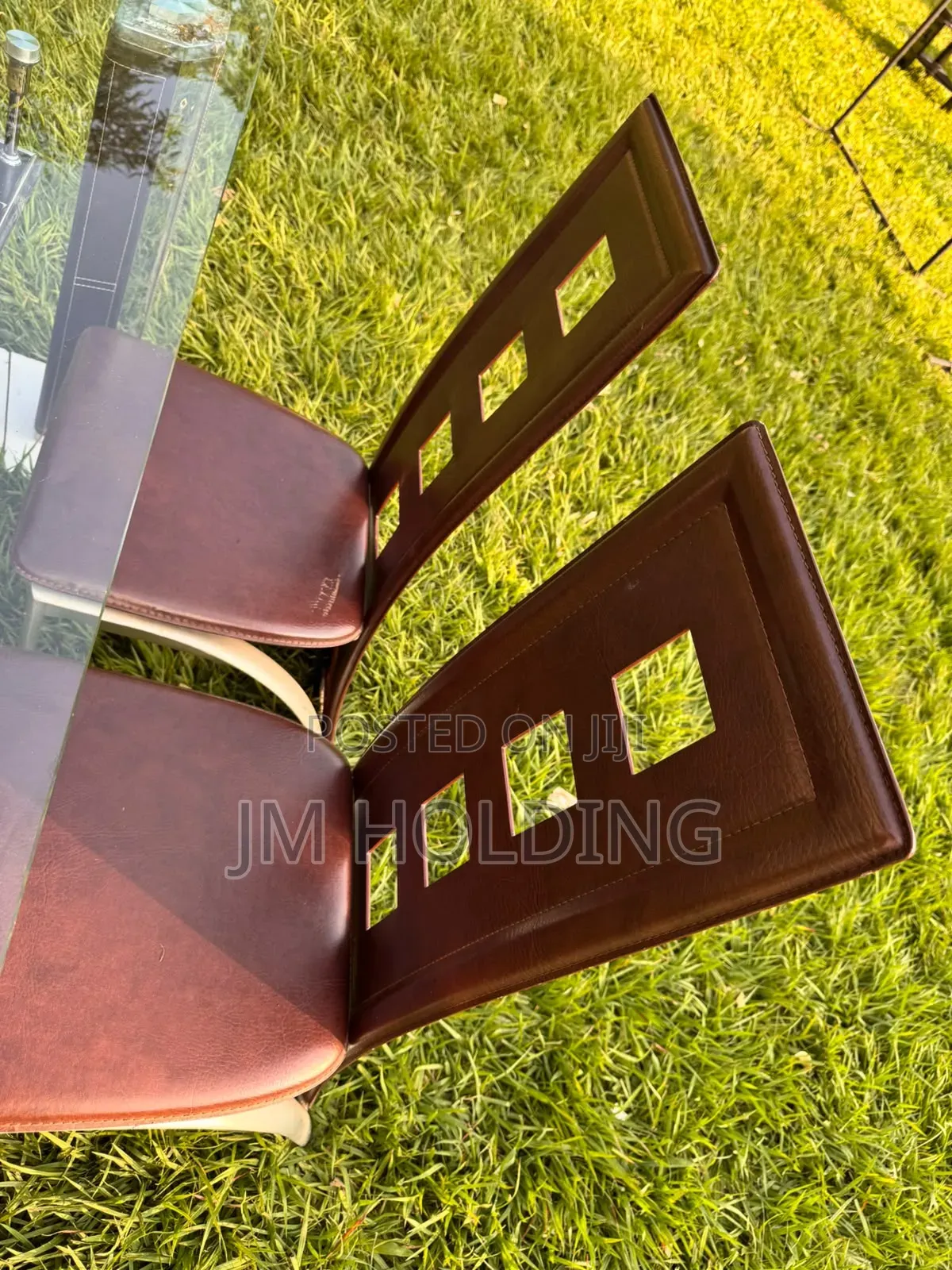 Elegant Glass Top Dining Table With 3 Leather Chairs