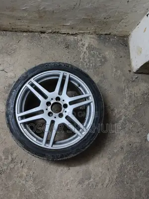 Mercedes Benz 18-Inch Rims With 245/40 R18 Tires .