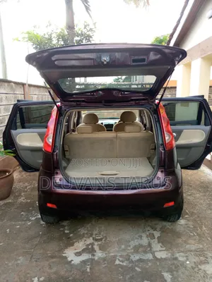 Nissan Note 2010 Maroon