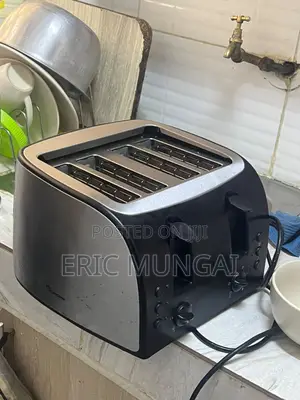 Clean, Used 4-Slice Stainless Steel Toaster