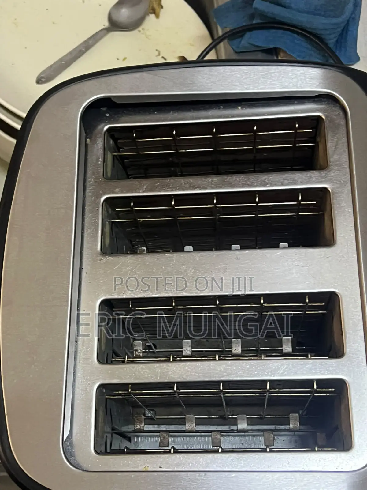 Clean, Used 4-Slice Stainless Steel Toaster