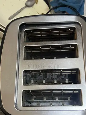 Clean, Used 4-Slice Stainless Steel Toaster