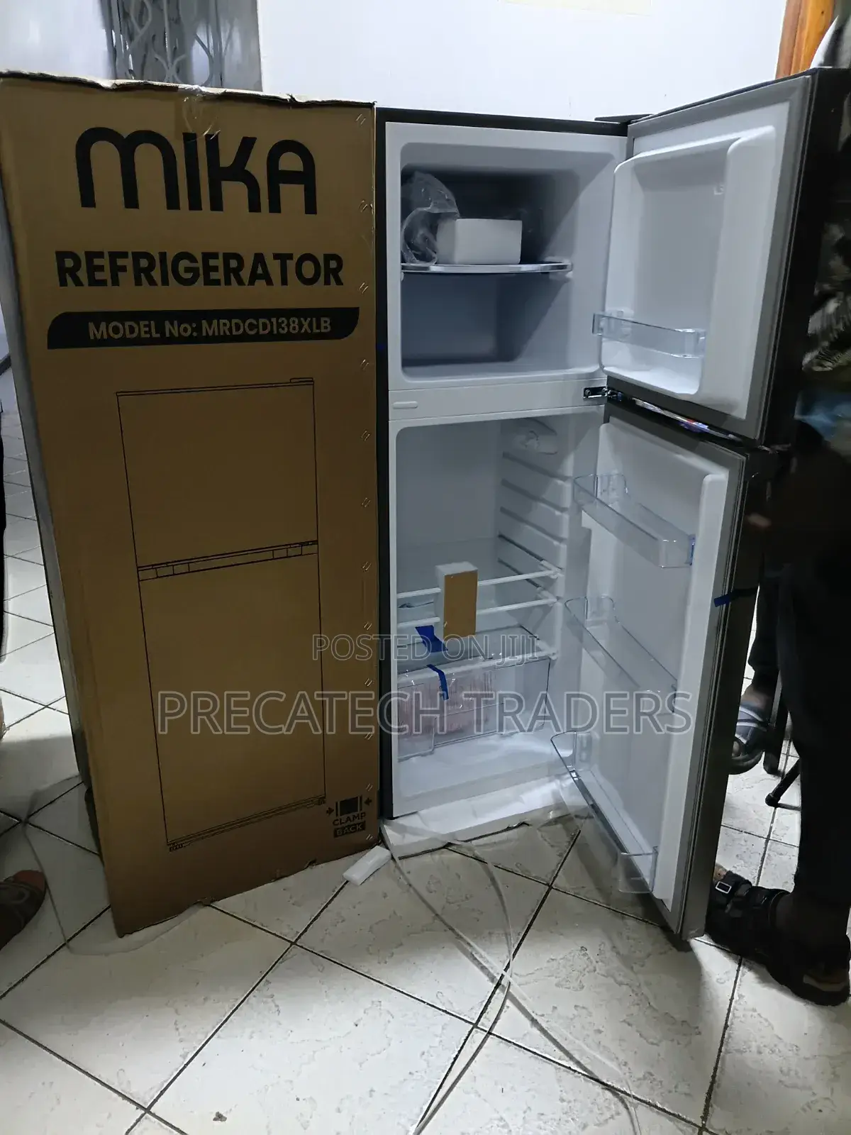 Mika 138l Frost Refrigerator With Top Freezer