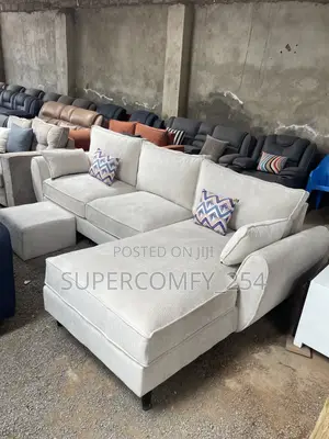 A White Butterfly Design L Shape Sofa