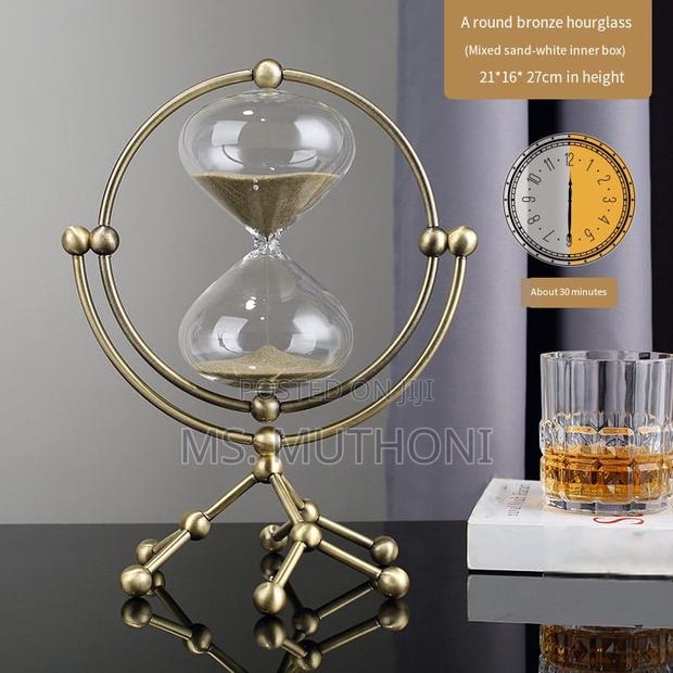 Stunning Rotating Bronze 30 Minutes Hourglass - main view