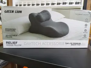 Green Lion Relief Wedge Pillow With Ergonomic Contours.