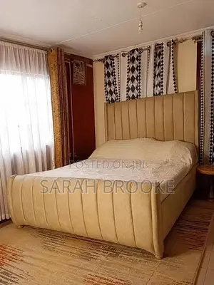 Queen Sized Tufted Bed
