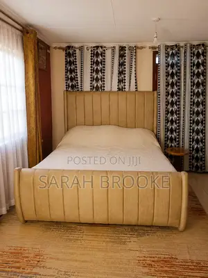 Queen Sized Tufted Bed