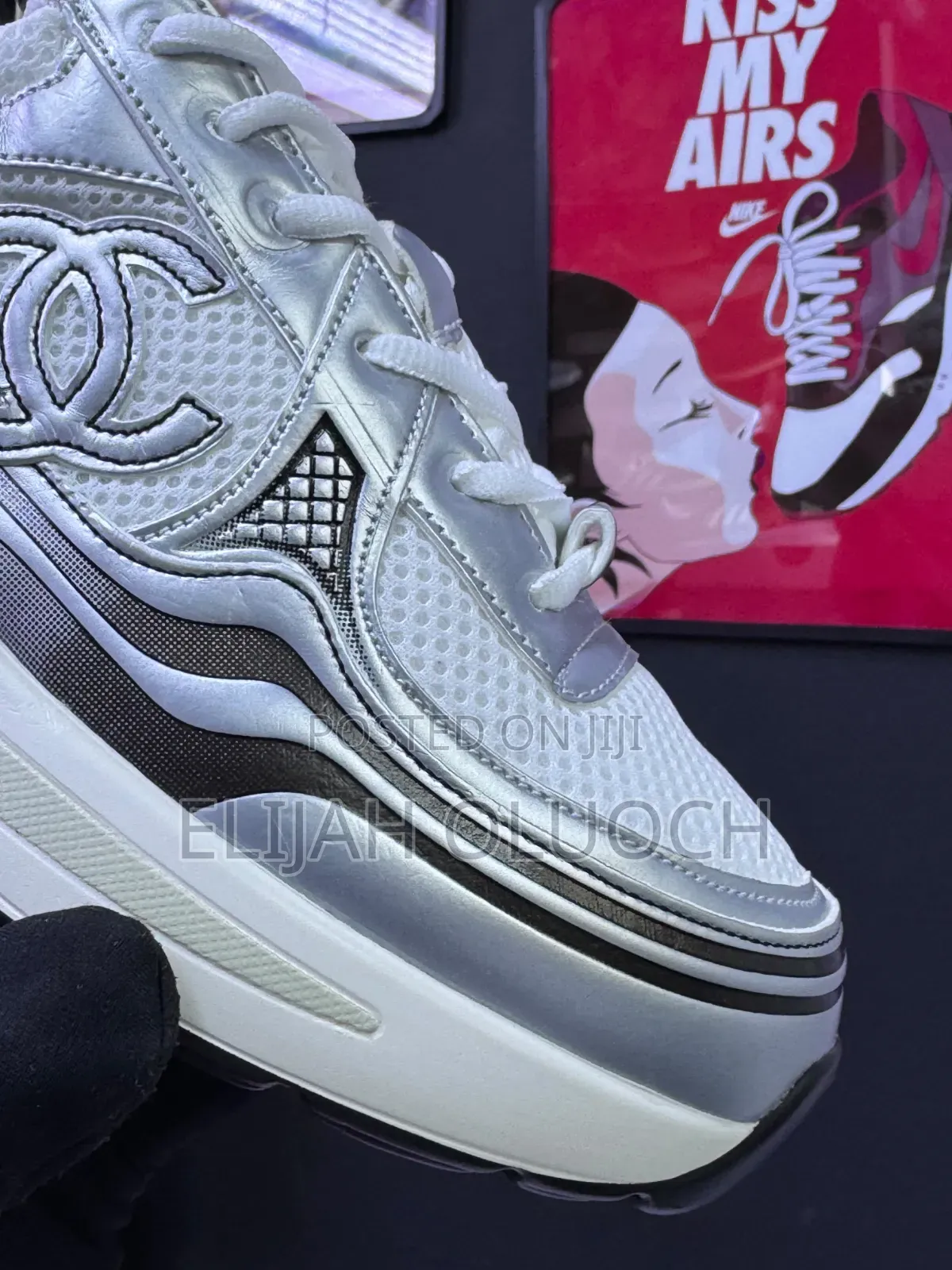 Chanel Trainers in White and Silver.