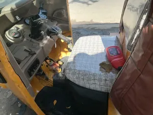 Bajaj RE 2023 Yellow