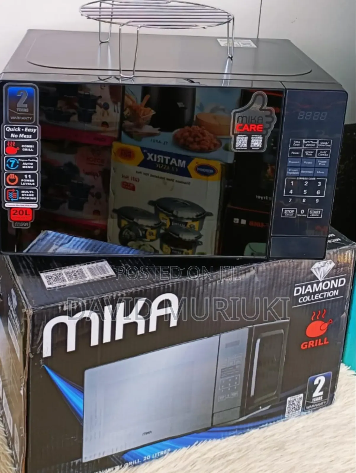 Black 20 Litres Mika Manual Microwave.
