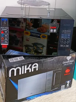 Black 20 Litres Mika Manual Microwave.