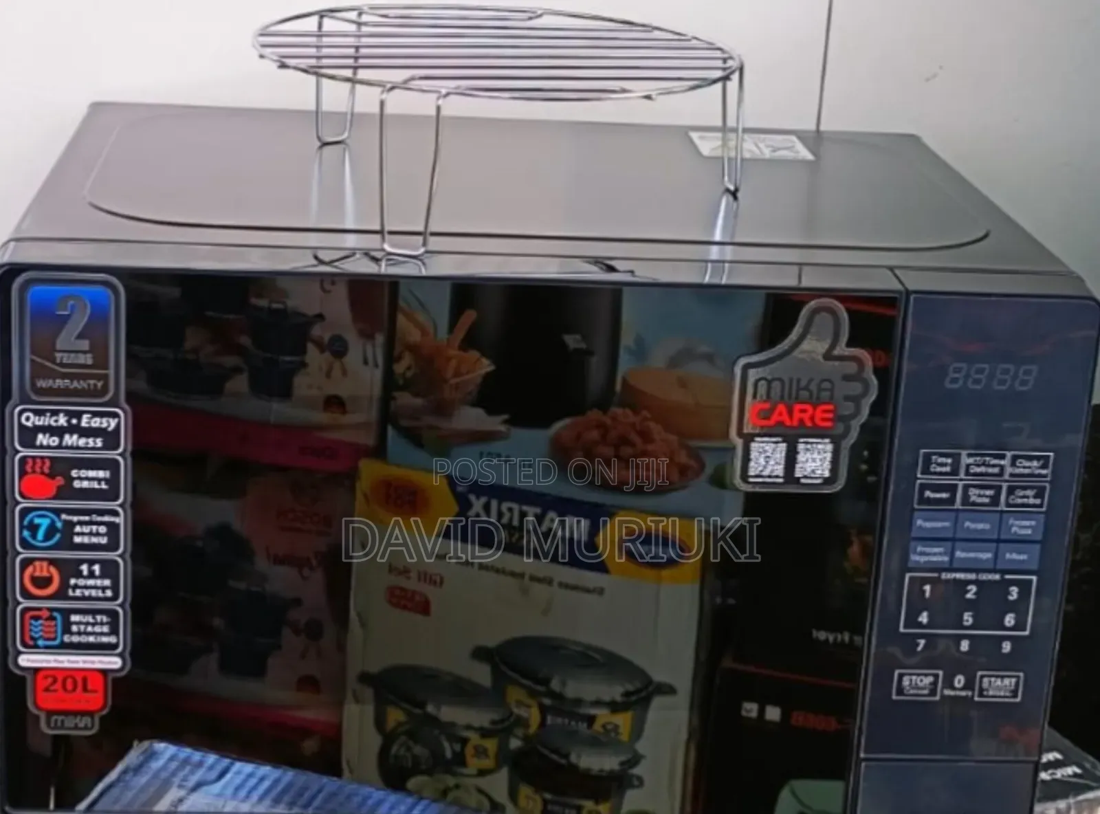 Black 20 Litres Mika Manual Microwave.