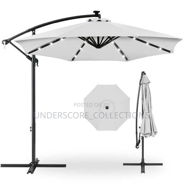 10ft Solar Offset Umbrella With Led Lights for Evening Illumination.