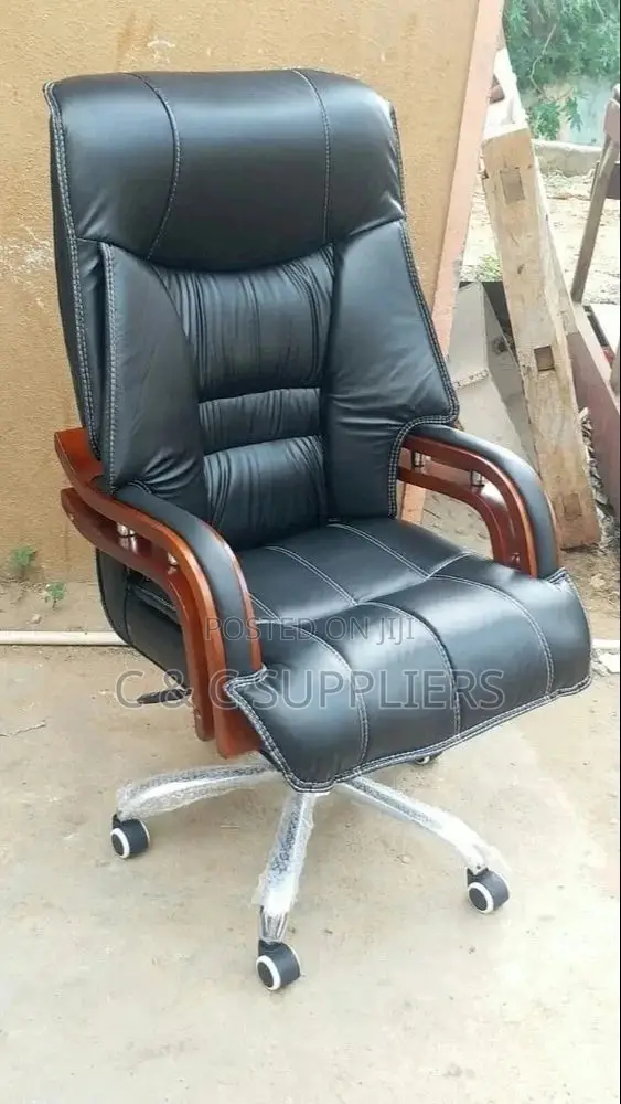 Leather High Back Chair With Mahogany Armrest