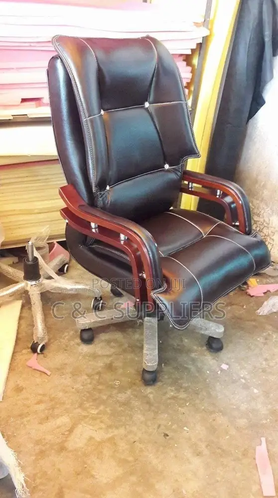 Leather High Back Chair With Mahogany Armrest