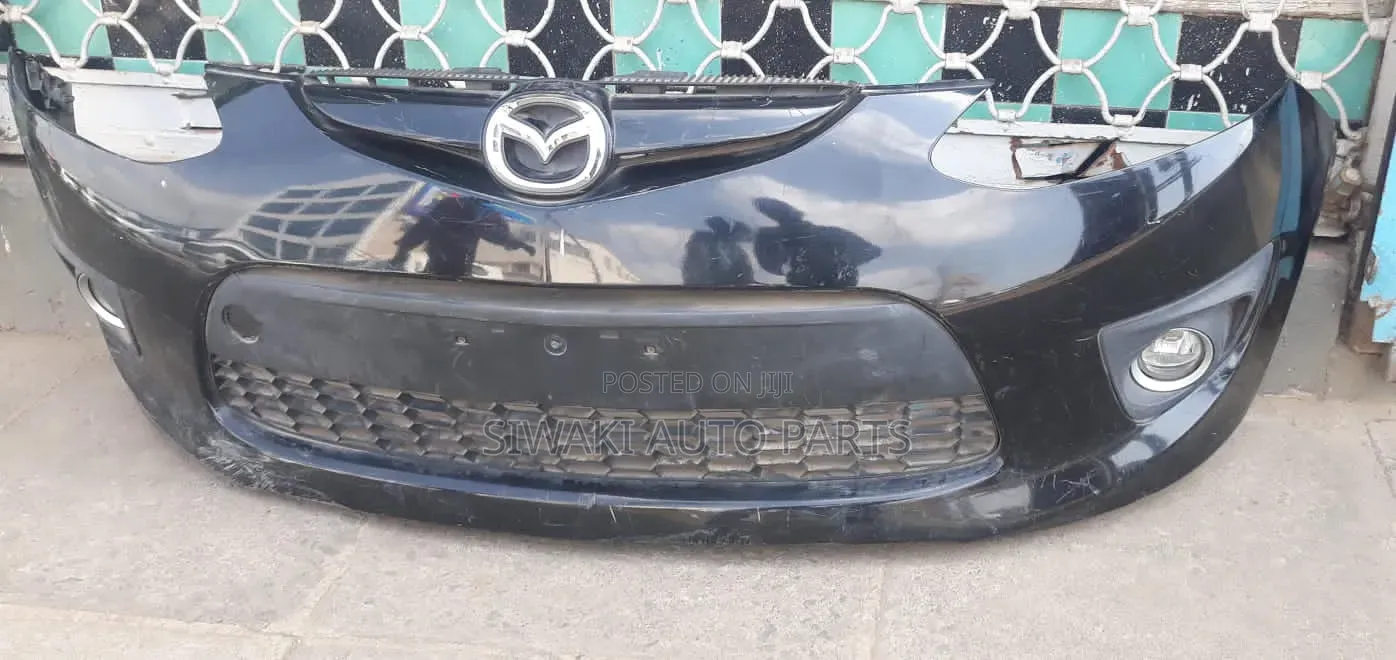 Mazda Demio 2012 Front Bumper Complete With Foglight and Grill