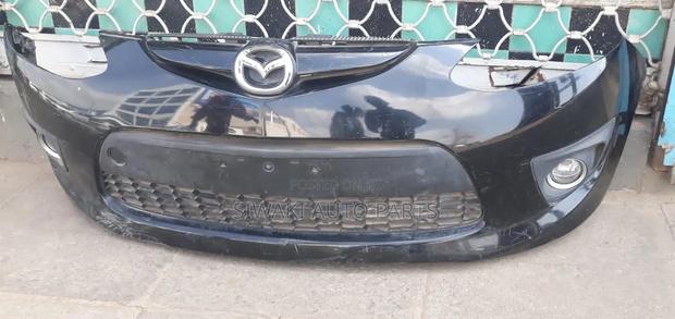 Mazda Demio 2012 Front Bumper Complete With Foglight and Grill