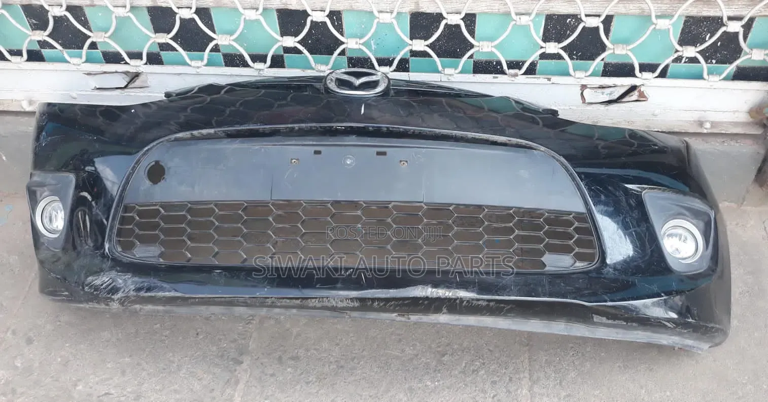 Mazda Demio 2012 Front Bumper Complete With Foglight and Grill