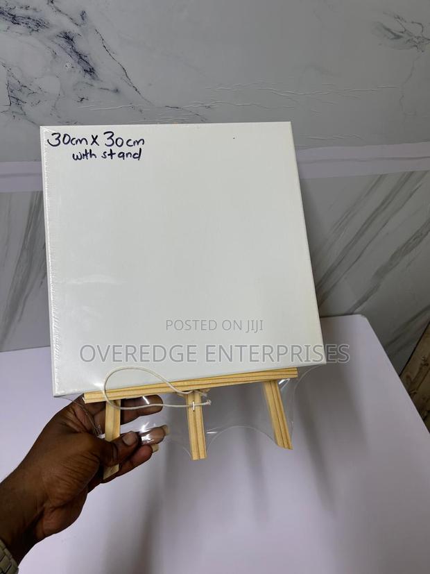 Painting Canvas Board and an Easel Wooden Stand
