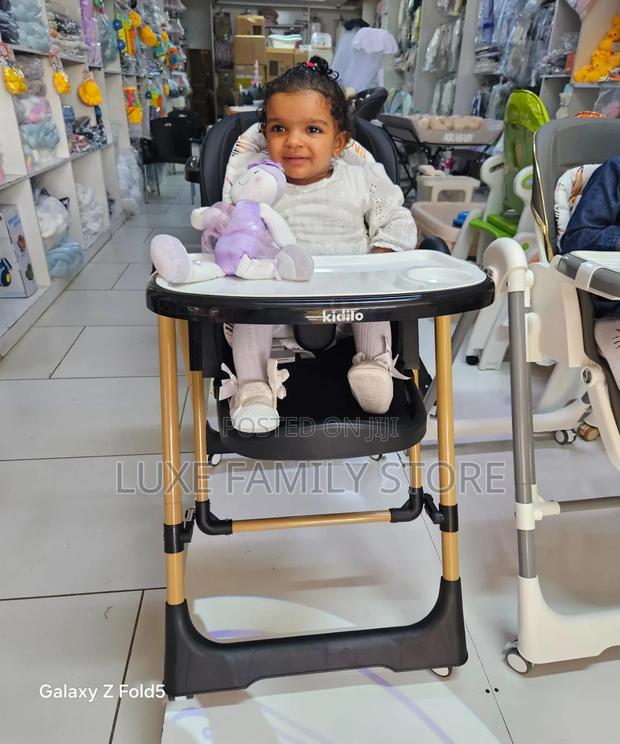 Adjustable Height Manual Swing High Chair