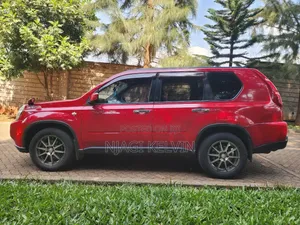 Nissan X-Trail 2.5 Petrol 4x4 SE 2010 Red