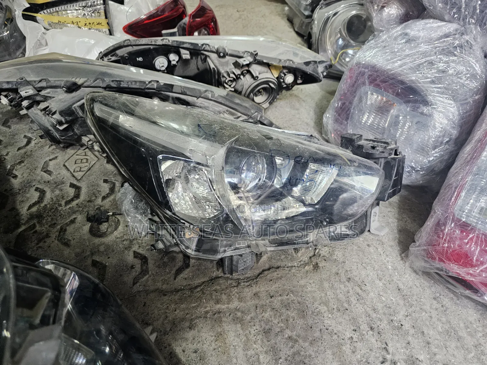 Demio Headlight