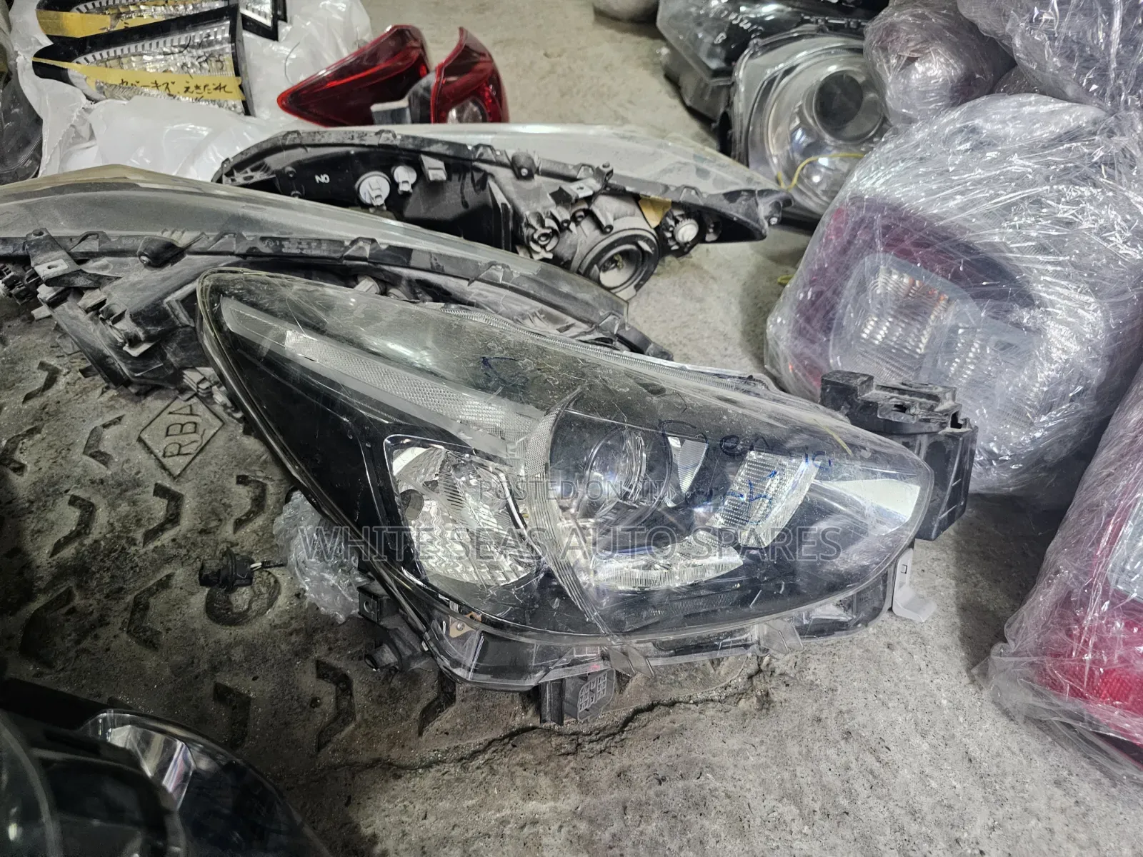Demio Headlight