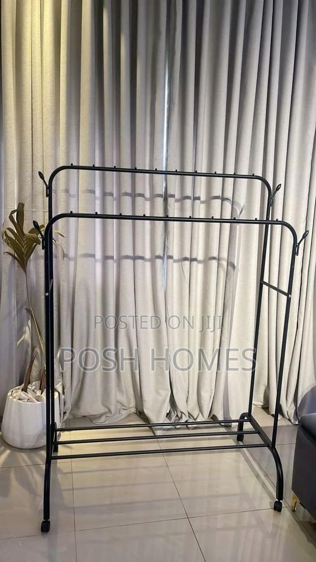 Double Pole Clothing Rack With Wheels Lower Storage Shelf - thumbnail 2