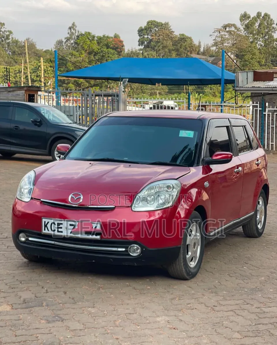 Mazda Verisa 2009 Red