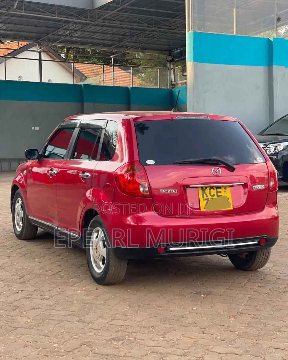 Mazda Verisa 2009 Red