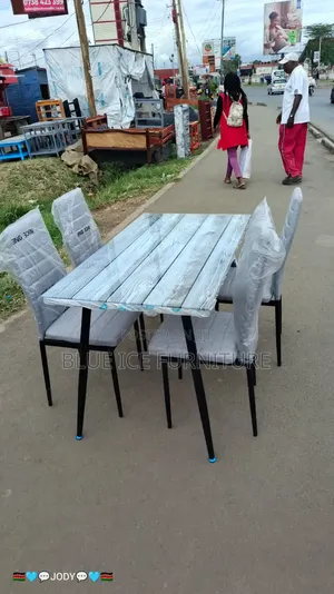 4 Seater Glass Dining Table Set With Cushion Chair
