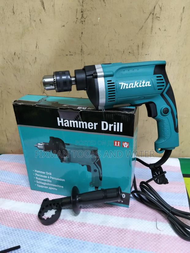 Makita Impact Drill 710 Watts Hammer and Extra Handle and Free Bits - thumbnail 2
