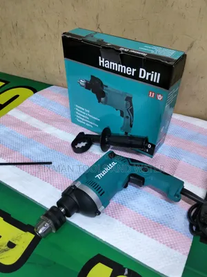 Power Makita Impact Hammer Drill 240 v 710 Watts and Free Bits