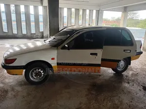 Mitsubishi Lancer 1990 White