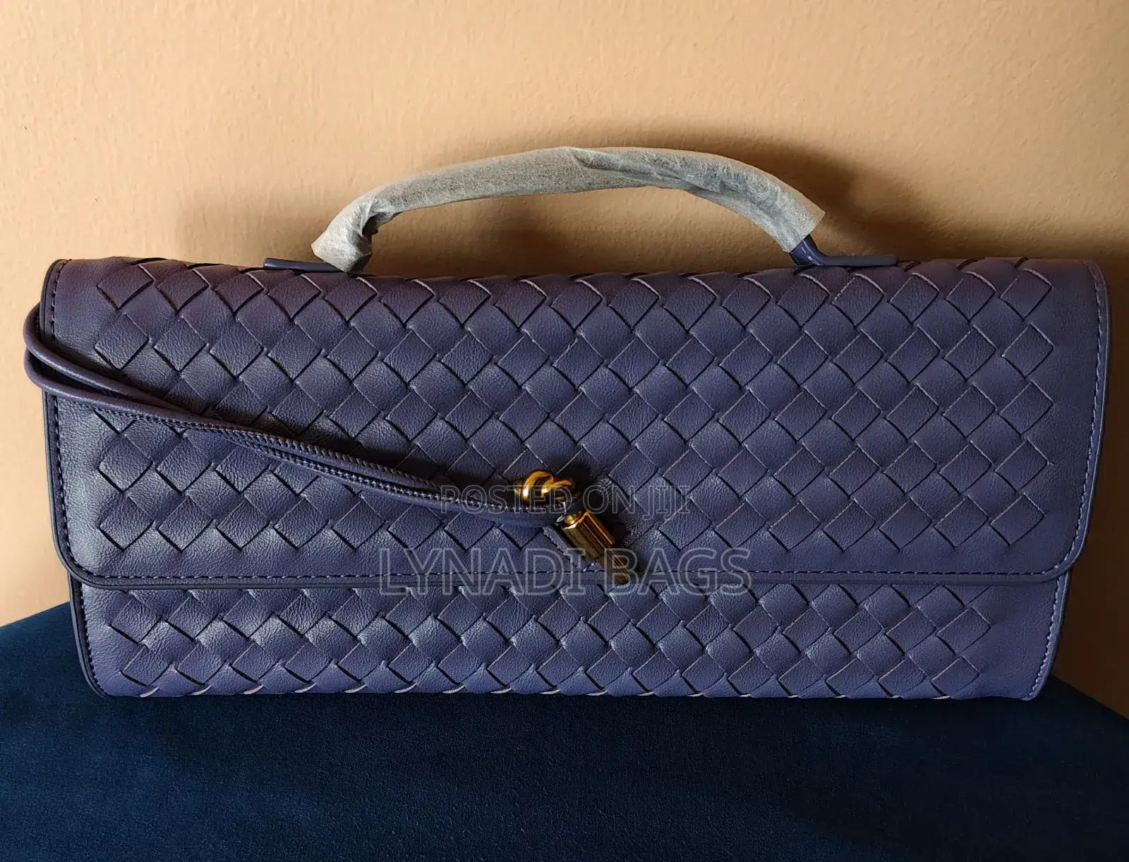 Woven Soft Leather Clutch Bag