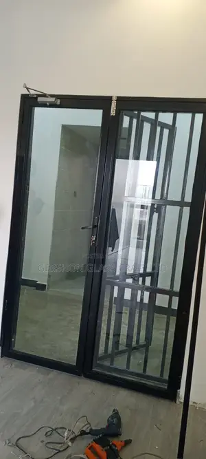 Aluminium Double Door Complete With Glass and Door Closer