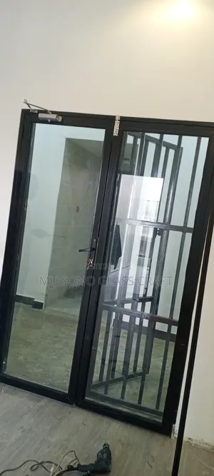 Aluminium Double Door Complete With Glass and Door Closer