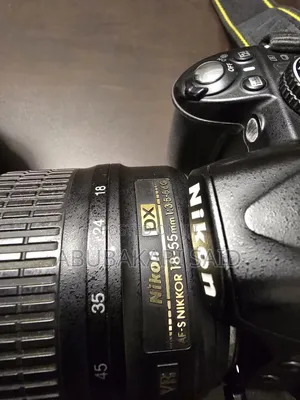 Nikon D3100 DSLR + 18-55mm VR Lens + 70-300mm Telephoto Lens + Bag
