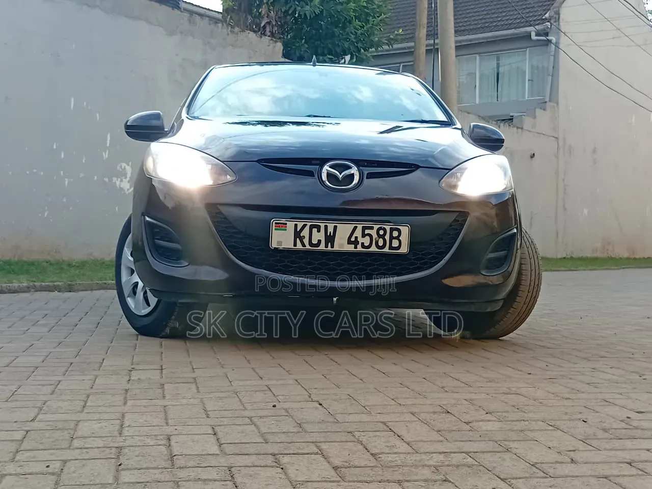 Mazda Demio 2012 Brown
