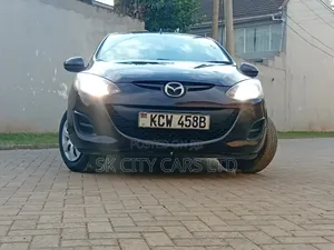 Mazda Demio 2012 Brown