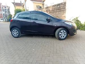 Mazda Demio 2012 Brown