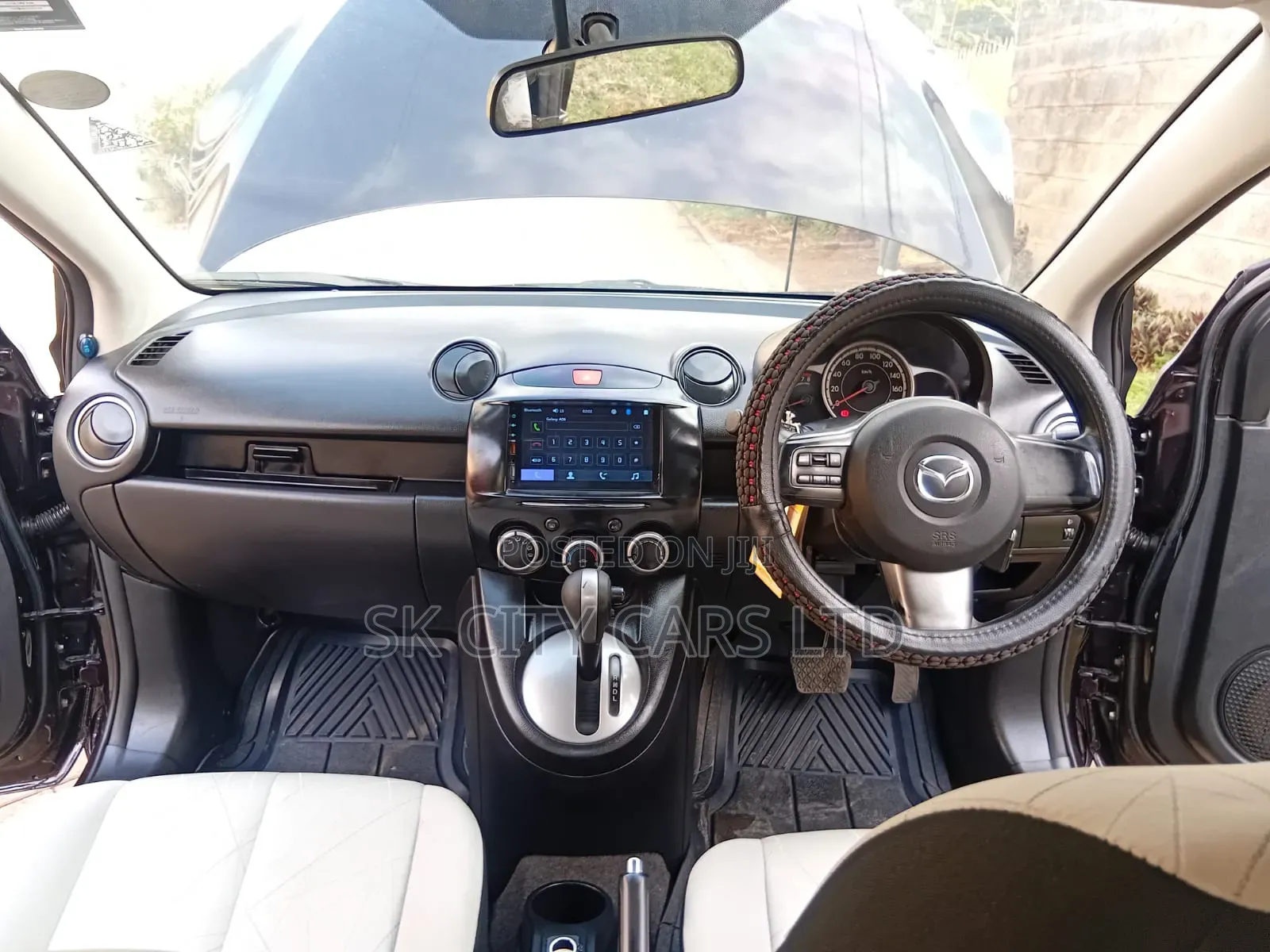 Mazda Demio 2012 Brown
