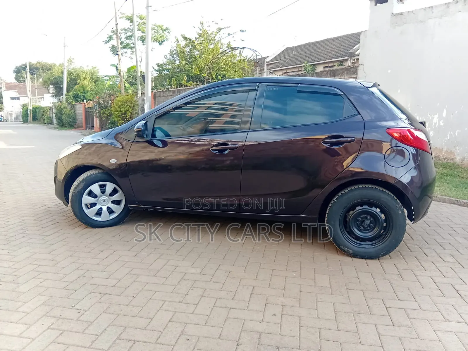 Mazda Demio 2012 Brown