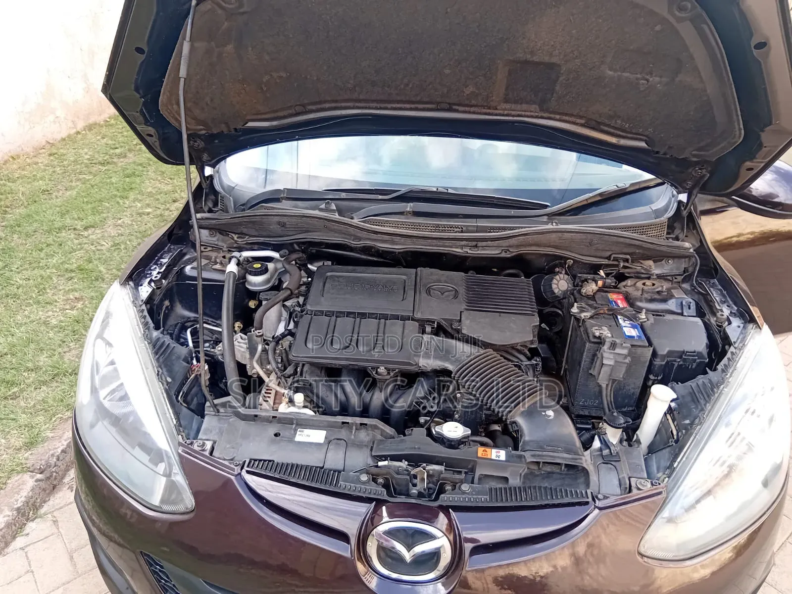 Mazda Demio 2012 Brown