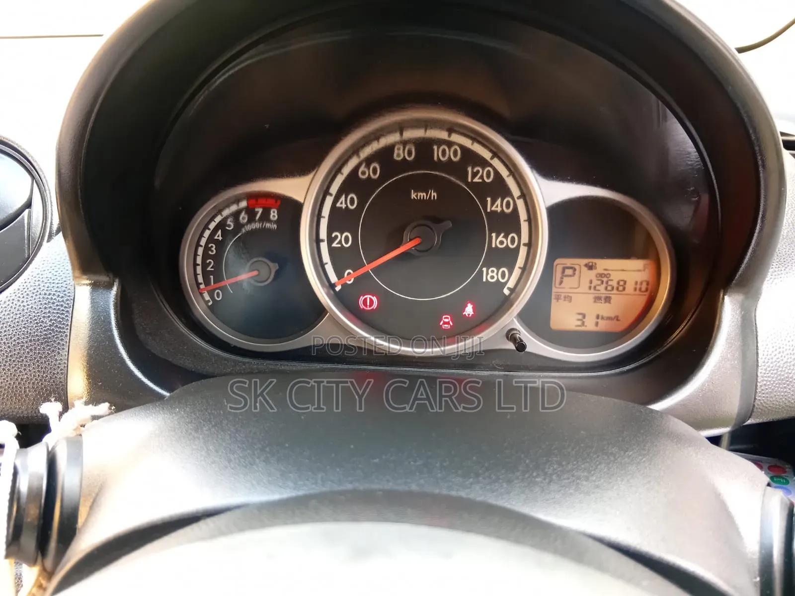 Mazda Demio 2012 Brown
