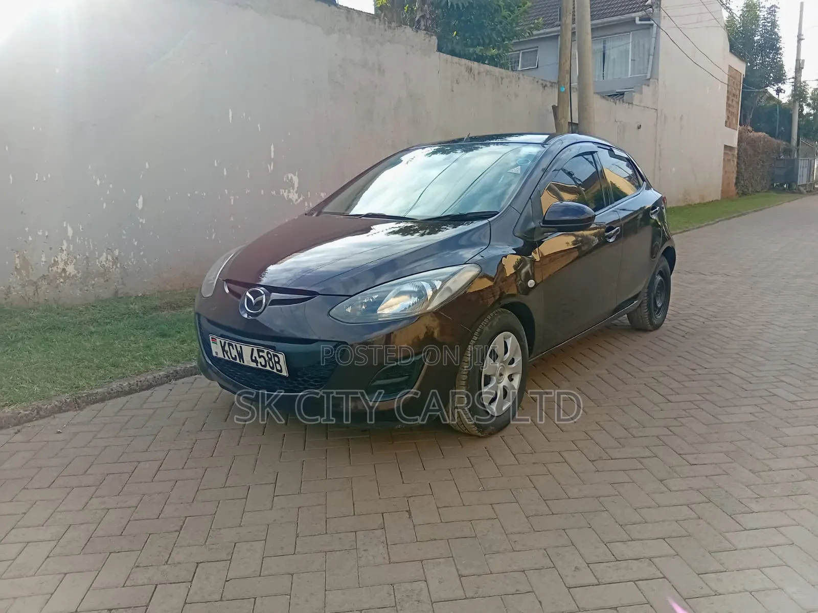 Mazda Demio 2012 Brown